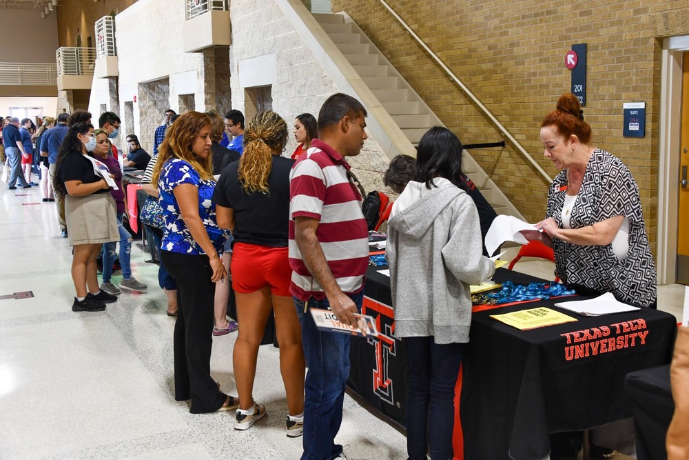 students and parents at college and career night
